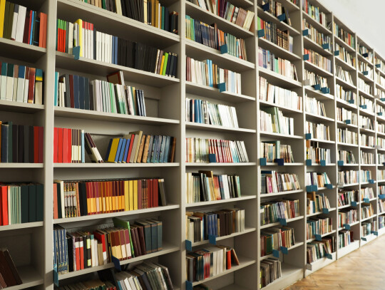 View of shelves with books in library