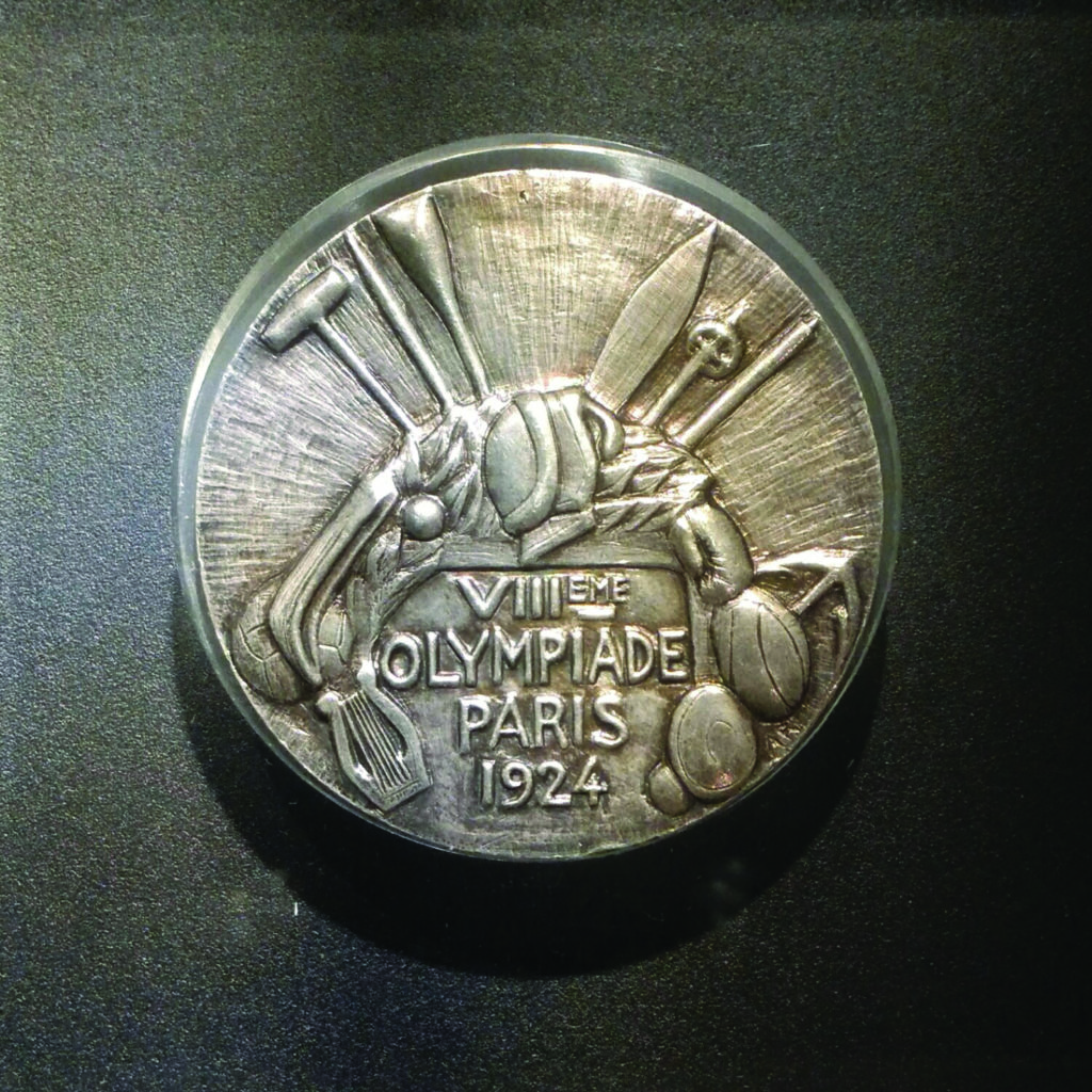 Medal olimpijski zdobyty przez kolarza Jozefa Langego z pierwszej polskiej reprezentacji olimpijskiej na letniej Olimpiadzie w Paryżu